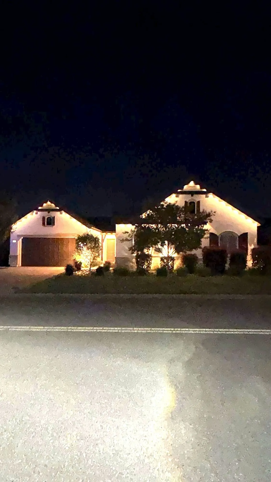Roofline, eaves and the garage run, on a timer.